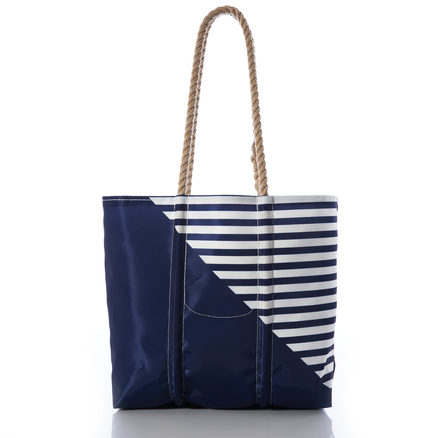 Sea Bags’ Custom Monogram Breton Stripe Anchor Medium Tote, crafted from recycled sail cloth, features a navy blue nautical design with rope handles and a diagonal white panel adorned with horizontal navy stripes, shown on a white background. by Sea Bags