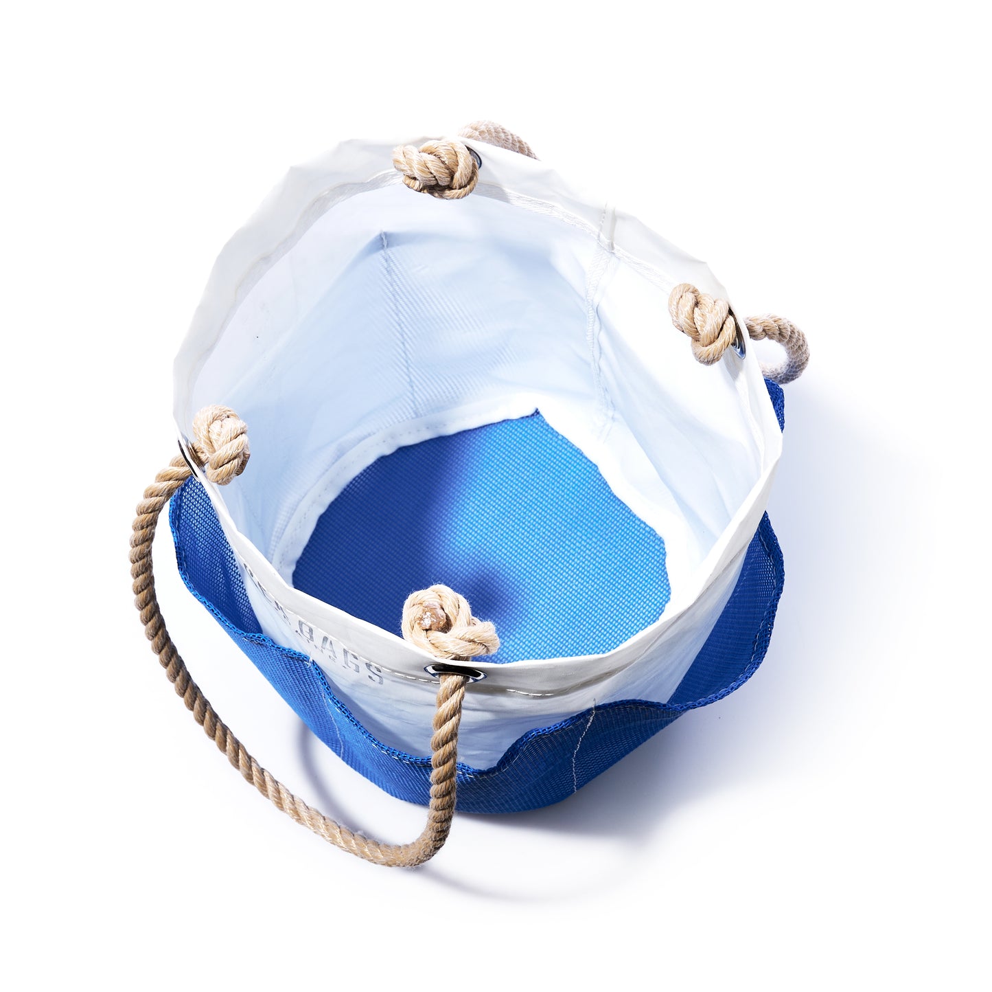 A Harbor Blue Gardeners Bucket Bag by Sea Bags, featuring a round design with a blue base, white mesh sides, sturdy rope handles with knotted details—shown from above on a white background. Durable and ideal for carrying gardening essentials. by Sea Bags
