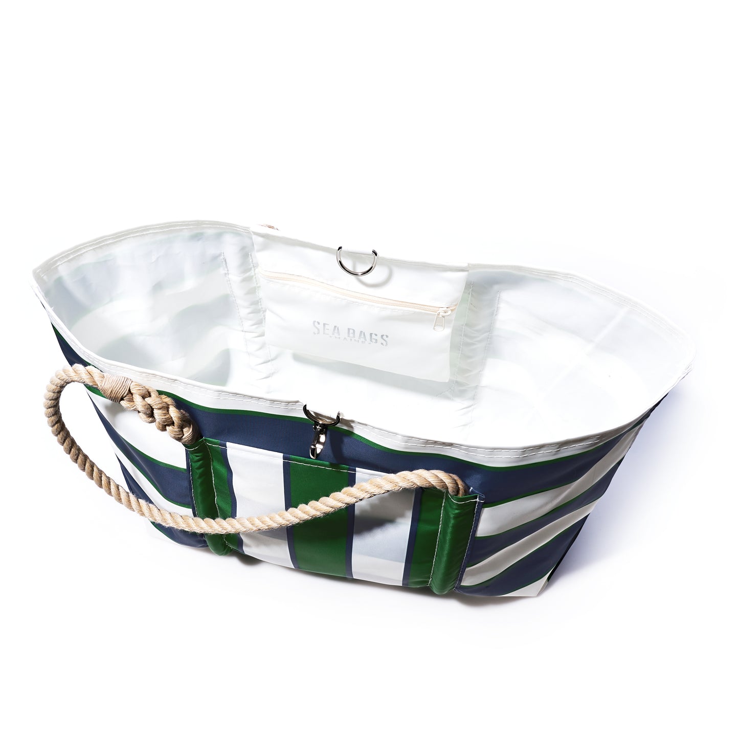 Crafted by Sea Bags, the Preppy Stripe Pier Tote is a spacious, open tote made from recycled sail cloth and accented with navy and green vertical stripes. It features iconic New England rope handles and a white interior equipped with a zippered pocket labeled SEA BAGS, combining timeless style with eco-friendly craftsmanship. by Sea Bags