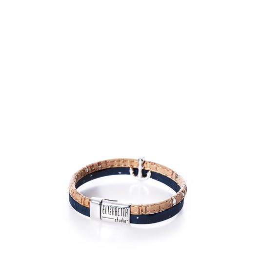 The Classic Cork Bracelet Anchor on Navy by Elisabetta Studio is displayed on a white background, featuring a magnetic nickel-free clasp engraved with the brand name. by Sea Bags
