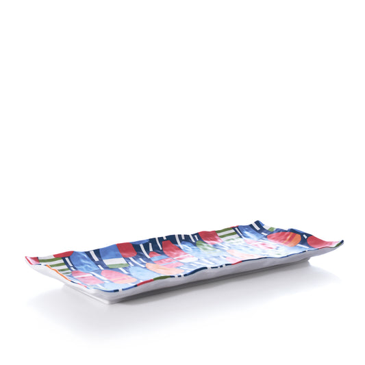 The Nautical Buoys Appetizer Tray by Merritt International Inc dba Merritt Designs is a rectangular ceramic plate with wavy edges, featuring a colorful abstract pattern inspired by nautical buoys. Set against a plain white background, its perfect for coastal entertaining or as a vibrant addition to your lake house serveware collection. by Sea Bags