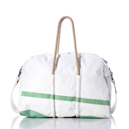 Sea Bags Vintage US Weekender—this white duffle bag features green diagonal stripes, rope handles, and a removable shoulder strap, beautifully displayed on a reflective surface against a white background—an ideal choice for your next stylish getaway. by Sea Bags