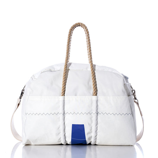 Sea Bags Vintage JY Weekender duffel bag features hemp handles, blue accents, and zigzag stitching for a timeless look. Shown here on a white background with a subtle reflection. by Sea Bags