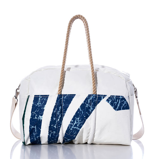 The Vintage Seahawk Weekender by Sea Bags features blue diagonal stripes on white, tan rope handles, and an adjustable shoulder strap—a stylish vintage bag perfect for your next getaway, shown against a white background. by Sea Bags
