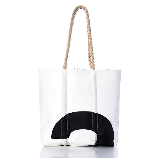 Sea Bags Vintage Black 2 Medium Tote features hand-spliced rope handles and a bold black semicircle on the front, displayed against a plain white background. Inspired by classic Maine craftsmanship, this tote blends timeless style with everyday functionality. by Sea Bags