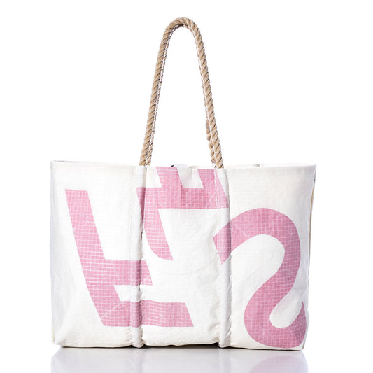 Sea Bags Vintage Flying Scot Large Tote, featuring thick twisted rope handles and bold pink lettering, is photographed against a white background. by Sea Bags