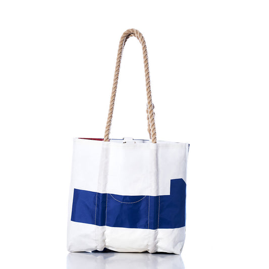 Sea Bags Vintage Blue 13 Handbag features a bold blue geometric design at the bottom, two thick hemp rope handles inspired by classic sail insignias, and is photographed against a plain white background. by Sea Bags