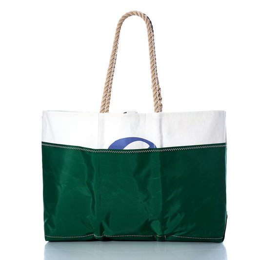 Sea Bags Vintage J105 Ogunquit Beach Tote features green and white panels crafted from recycled sail cloth, sturdy rope handles, and a partially visible blue letter on the upper section—a charming beach tote with nautical vintage appeal. by Sea Bags