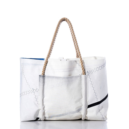 The Vintage Black and White Wharf Tote by Sea Bags features zigzag stitching, rope handles, and a front pocket. Handcrafted from recycled sail cloth in true Portland, Maine tote style, it is photographed against a white background. by Sea Bags