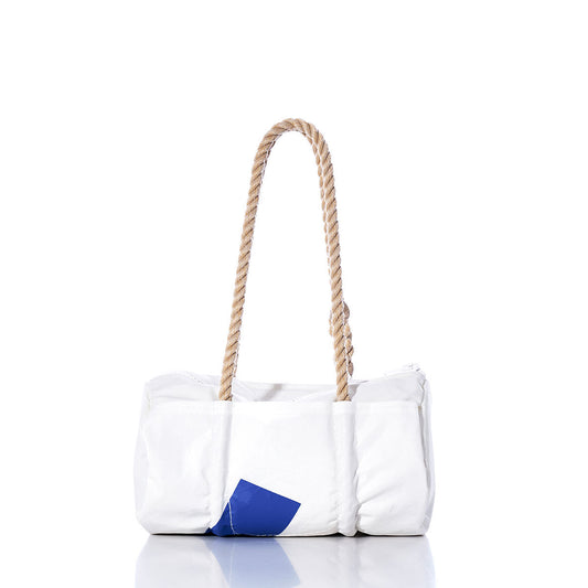 The Vintage JY Baguette Bag by Sea Bags features a white rectangular design, thick hand-spliced hemp rope handles, and a small blue patch on the lower left corner, reminiscent of classic baguette bags, and is displayed on a white background. by Sea Bags