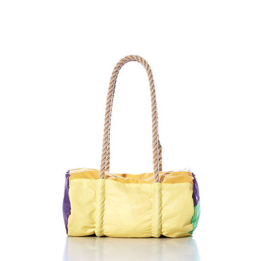 The Sea Bags Vintage Yellow Baguette Bag is a rectangular patchwork bag crafted from recycled sails, featuring purple and green accents and two hand-spliced hemp rope handles, displayed on a white background. by Sea Bags