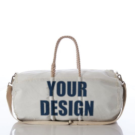 The Sea Bags Custom Design Duffel features a white exterior with beige rope handles, a matching beige shoulder strap, and YOUR DESIGN boldly printed in navy blue on the front—making it the ideal personalized travel bag for weekend trips or a stylish carry-on. by Sea Bags