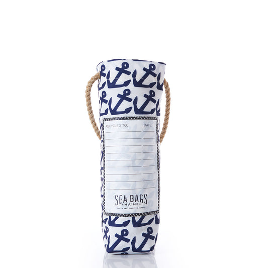 The Sea Bags Anchor Pop Wine Bag is a reusable white and blue tote crafted from recycled sail cloth, adorned with anchor patterns, a sturdy rope handle, and a SEA BAGS label on the front—making it an ideal and stylish hostess gift. by Sea Bags