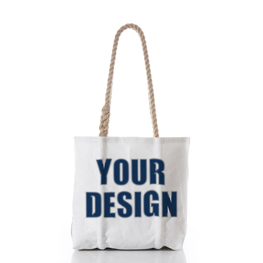 Sea Bags Custom Design Handbag with thick rope handles, shown upright against a white background. The front features the text YOUR DESIGN in large, bold navy blue letters. Ideal as a personalized tote, this bag is perfect for showcasing your unique style. by Sea Bags