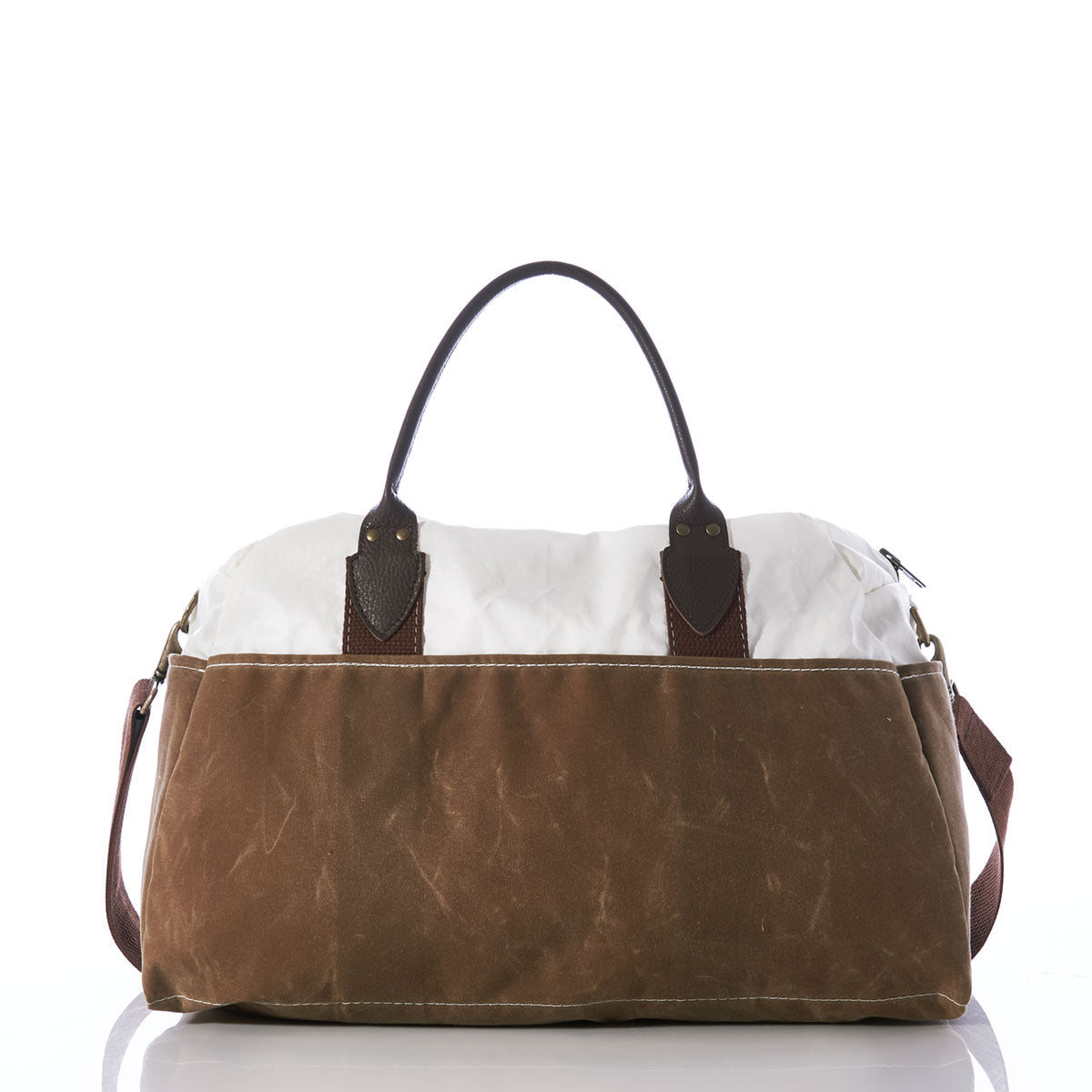 The Sea Bags Tan Chebeague Weekender is a brown and white waxed canvas duffle bag featuring leather handles and a convenient shoulder strap, shown against a white background—making it the perfect stylish carry-on for your next getaway. by Sea Bags