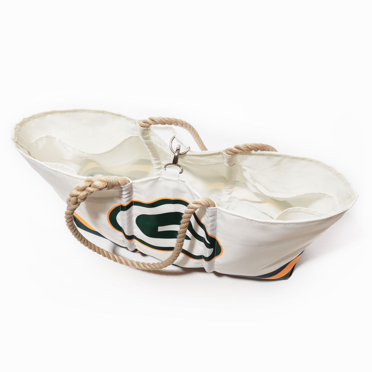 The Green Bay Packers Tailgate Tote by Sea Bags is crafted from recycled sail cloth and features a white canvas exterior with rope handles and a green and yellow G logo. Shown open and empty, it is viewed from above and at a slight angle. by Sea Bags