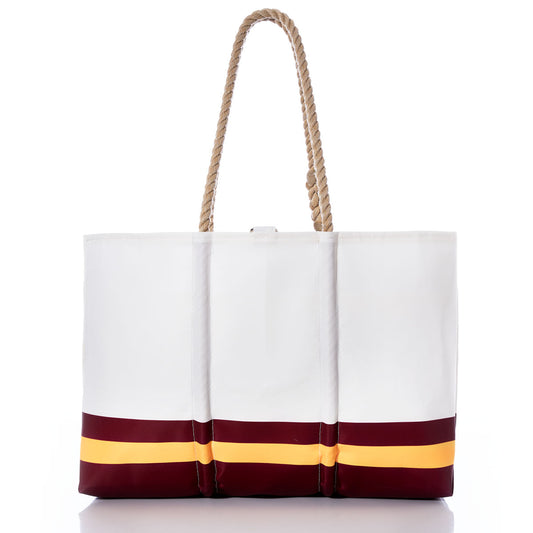The Washington Commanders Tailgate Tote by Sea Bags is a white tote bag featuring tan rope handles and maroon and yellow horizontal stripes near the bottom, inspired by the Commanders’ team colors. Made from recycled sail cloth, it is photographed on a white background. by Sea Bags