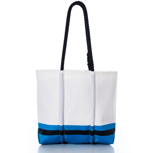 The Sea Bags Carolina Panthers Medium Tote is a white bag crafted from recycled sail cloth, featuring black rope handles and blue and black stripes at the bottom, displayed on a white background. by Sea Bags