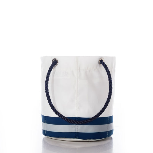 The Dallas Cowboys Beverage Bucket by Sea Bags features a white bucket design with two navy blue horizontal stripes and a dark blue rope handle, set against a plain white background—ideal as a stylish team-themed bag or an eco-friendly beverage bucket for your next sustainable cooler upgrade. by Sea Bags