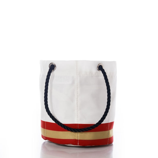The San Francisco 49ers Beverage Bucket by Sea Bags features a white fabric design crafted from recycled sail cloth, accented with navy rope handles and a horizontal red and gold stripe near the base. Set against a white background, this eco-friendly logo bag blends 49ers spirit and style with sustainable craftsmanship. by Sea Bags