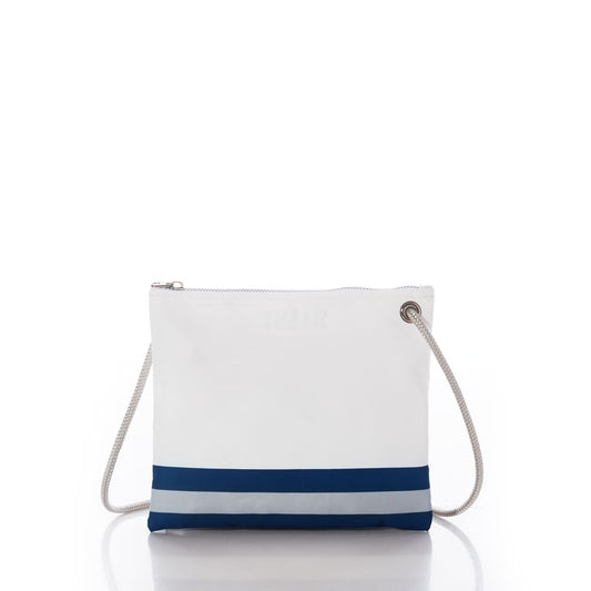 The Sea Bags Dallas Cowboys Slim Crossbody, crafted from recycled sail cloth, features a white zippered pouch design accented with a blue and gray stripe at the bottom, a silver grommet, and a white rope shoulder strap. This versatile bag is shown on a plain white background. by Sea Bags