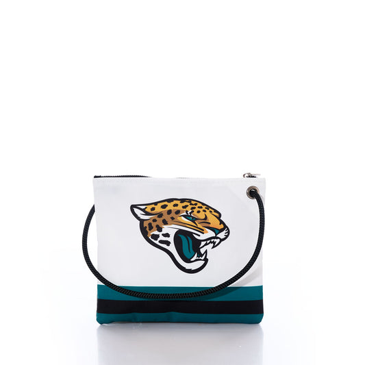 Carry your team pride in style with the Jacksonville Jaguars Slim Crossbody from Sea Bags. Featuring a white exterior crafted from durable recycled sail cloth, this unique bag sports teal and black stripes, a bold jaguar head logo on the front, a black zipper, and a black rope handle—making it the perfect accessory for any Jaguars fan. by Sea Bags