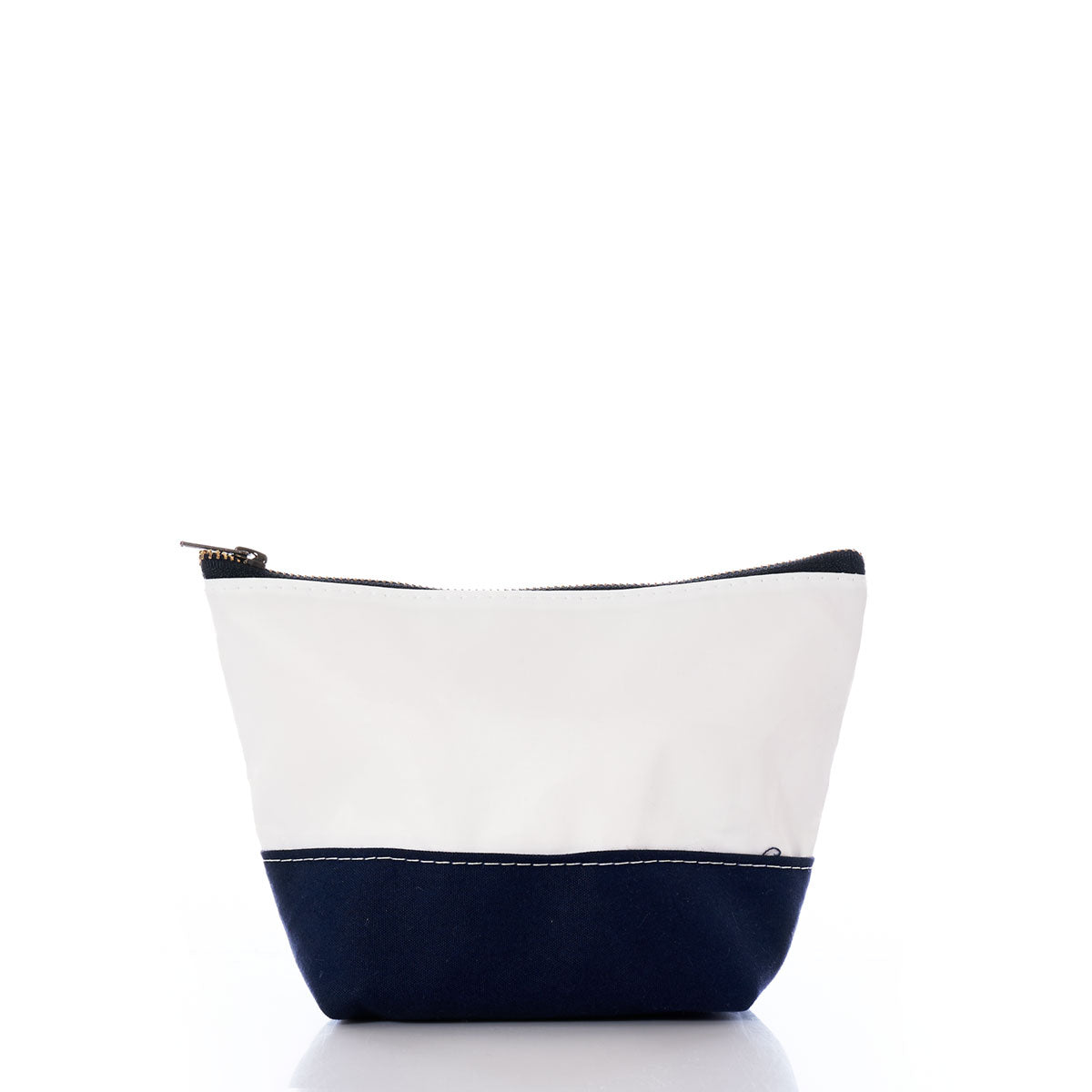 The Chebeague Cosmetic Bag by Sea Bags is a small zippered pouch featuring a white upper half and a dark blue lower half, crafted from recycled sailcloth with canvas and leather accents, shown against a plain white background. by Sea Bags