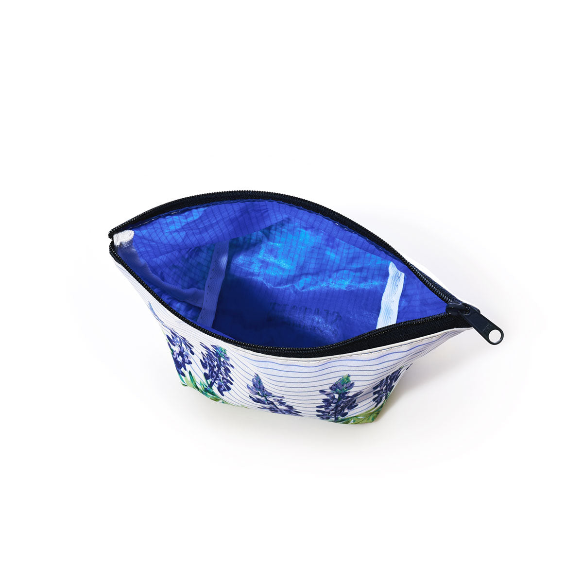 The Lupine Sailor Stripe Cosmetic Bag by Sea Bags is a small zippered makeup bag crafted from washable sailcloth for easy care and coastal charm. Featuring nautical-inspired stripes on the outside and a solid blue lining inside, its shown open from above. by Sea Bags