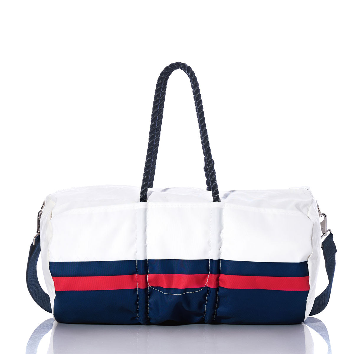 The Sea Bags New England Patriots Duffel is crafted from durable recycled sail cloth and features navy handles, an adjustable shoulder strap, and distinctive navy blue and red stripes on a white background. This stylish NFL duffel is shown against a white backdrop. by Sea Bags