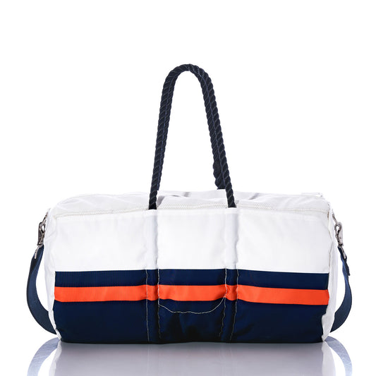 The Denver Broncos Duffel by Sea Bags features a white exterior with navy and orange horizontal stripes, black rope handles, and a detachable shoulder strap. Crafted from recycled sail cloth and displayed on a reflective surface, this stylish bag is the perfect accessory for any Denver Broncos fan. by Sea Bags