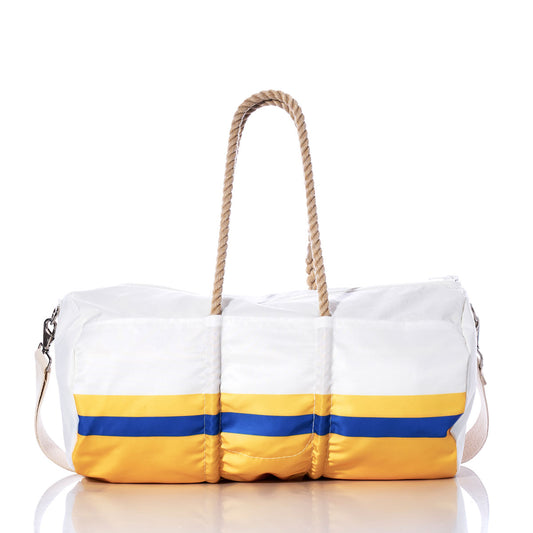 The Sea Bags Los Angeles Rams Duffel, made from recycled sail cloth and featuring yellow and blue stripes near the bottom, beige rope handles, and an adjustable shoulder strap, is photographed on a white background. by Sea Bags