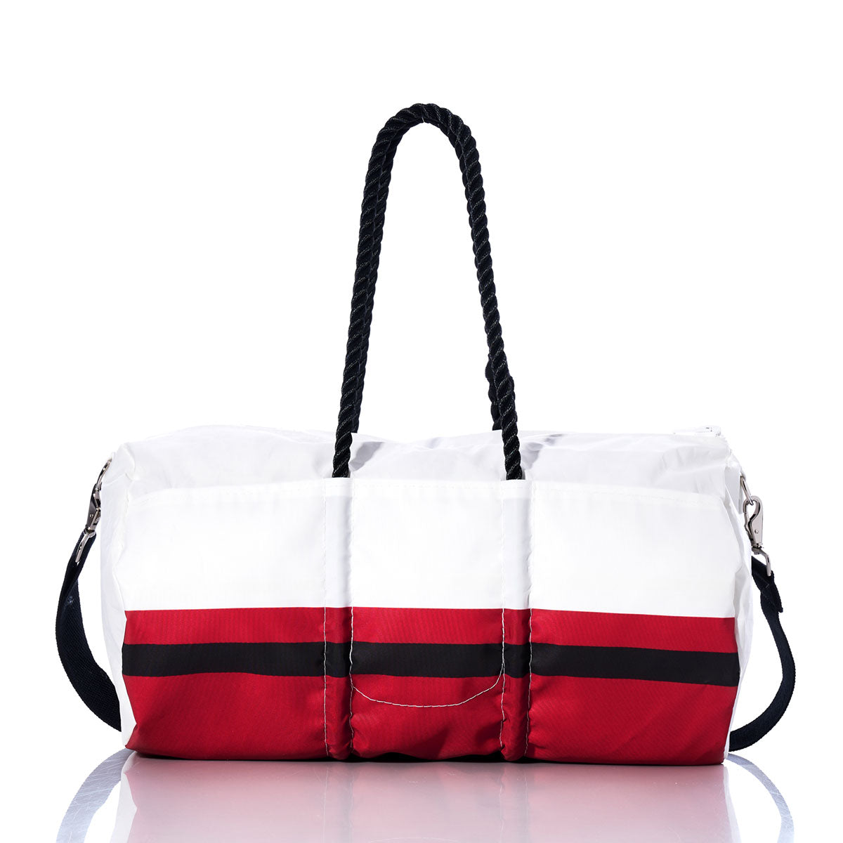 Introducing the Sea Bags Tampa Bay Buccaneers Duffel—a durable bag crafted from recycled sail cloth, featuring white and red panels, a black horizontal stripe, black rope handles, and an adjustable black shoulder strap. Shown on a reflective surface and officially licensed by the NFL, this duffel is perfect for any Tampa Bay fan. by Sea Bags