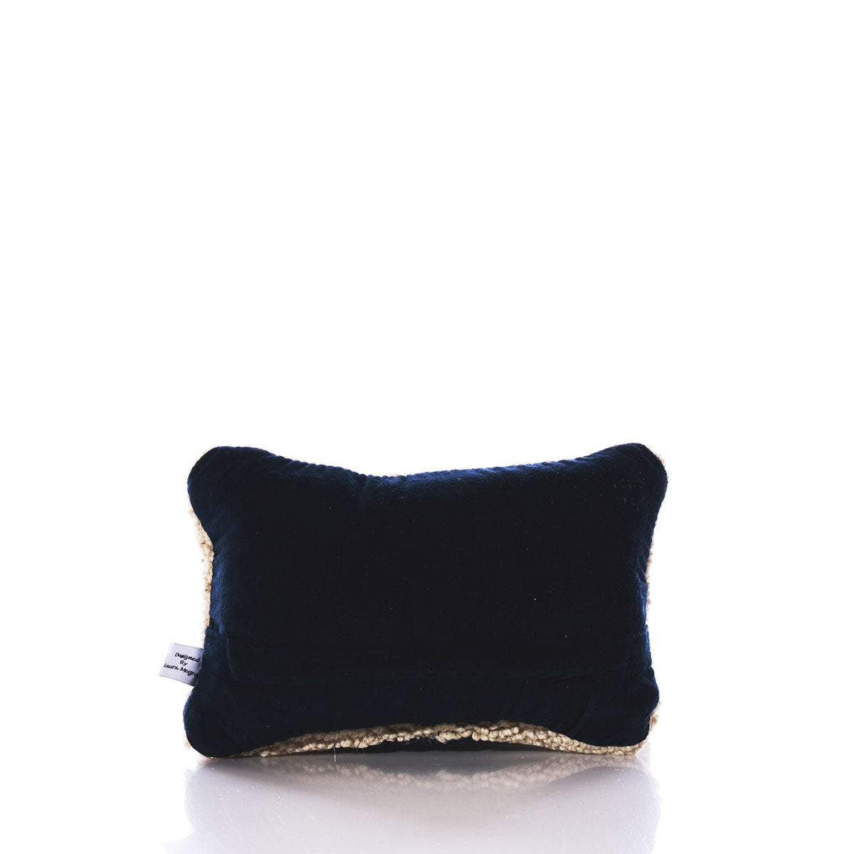 A small rectangular Chandler 4 Corners Wool Hand-hooked Maine Pillow in black, featuring light-colored textured edges, is centered on a white background, highlighting the cozy, handcrafted quality of this artisan wool pillow. by Sea Bags