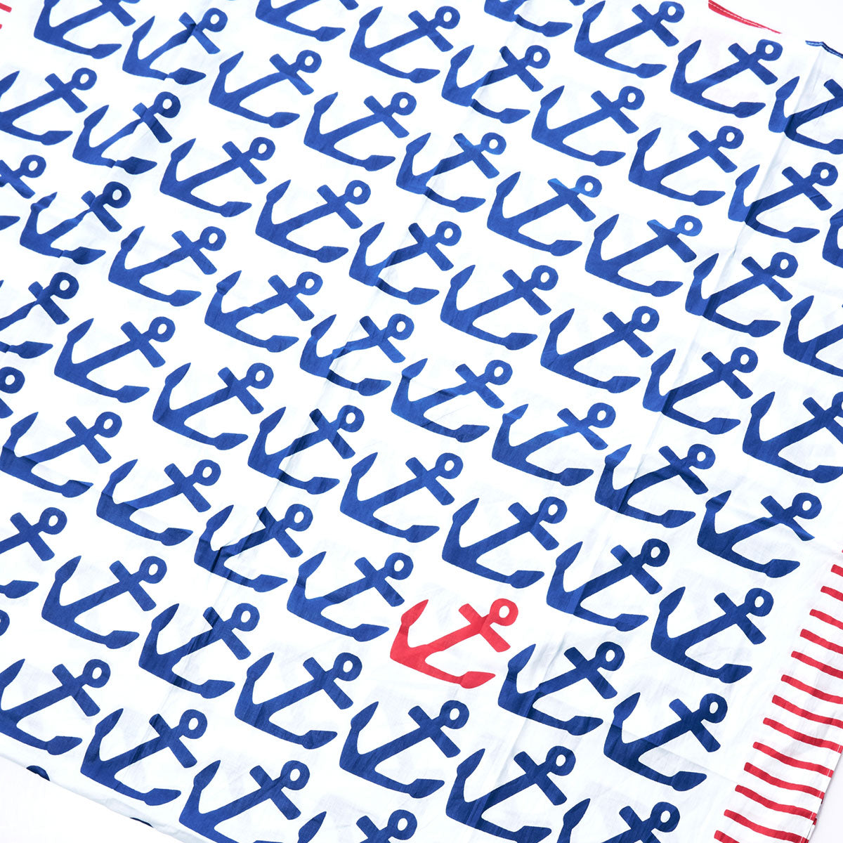 Crafted by Batela USA Inc, the Anchor Pop Scarf features white cotton fabric with an all-over blue anchor print accented by a single red anchor, and is finished with an eye-catching red and white striped border—making it the perfect nautical accessory for any coastal adventure. by Sea Bags