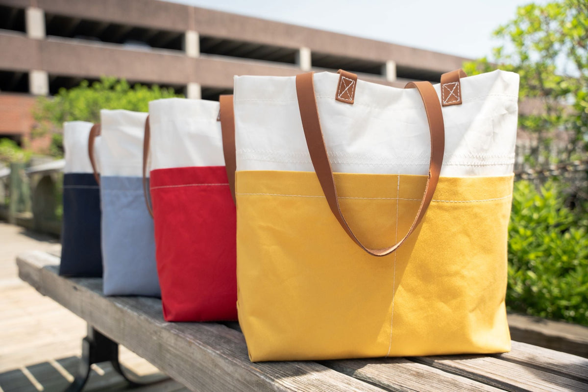 colorful totes for shopping with pockets and leather handles