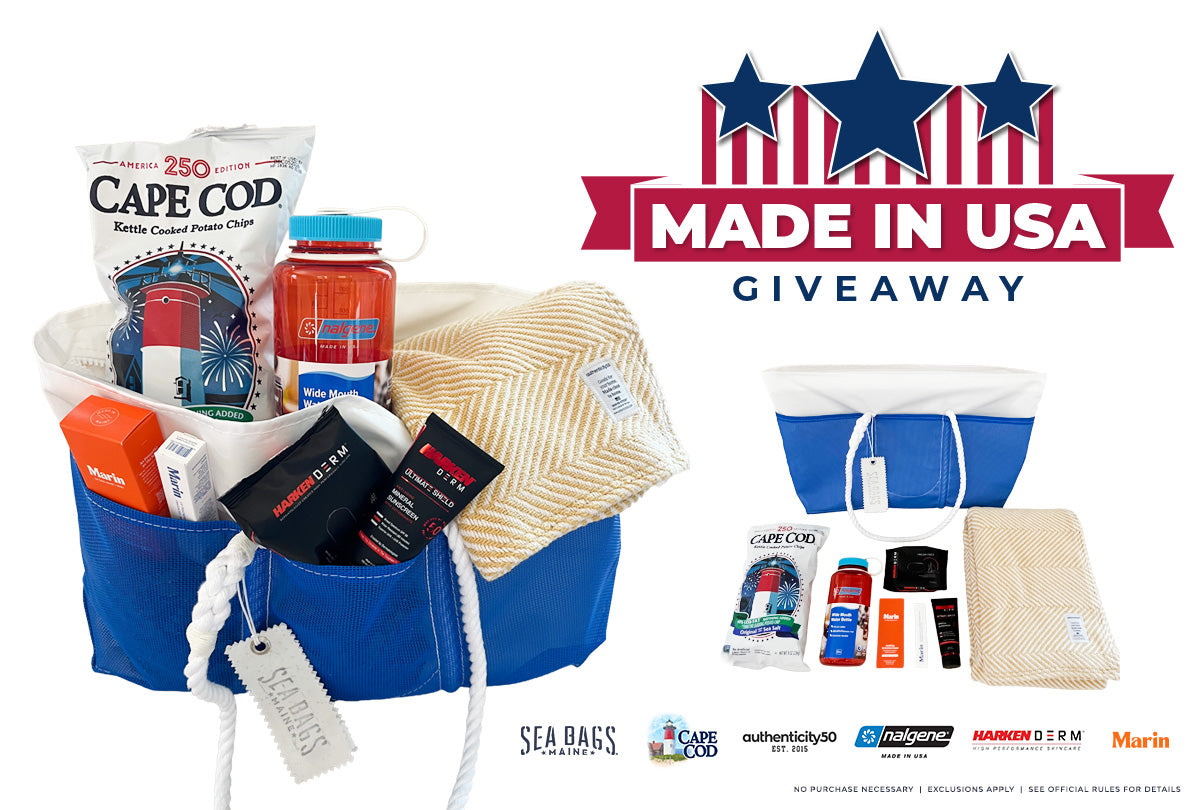 A curated gift set labeled 'MADE IN USA GIVEAWAY' featuring a blue and white tote bag filled with Sea Bays branded items, including a Cape Cod sandwich bag, a water bottle, a towel, and small toiletries, alongside smaller product views and logos on a white background.
