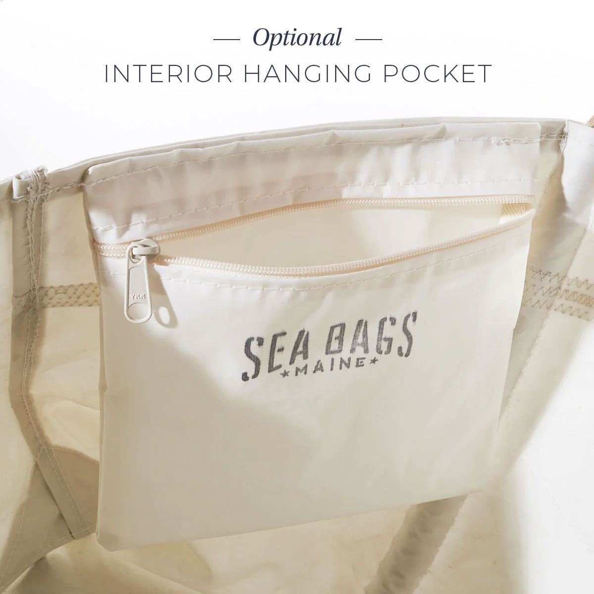 A white fabric interior hanging pocket with a zipper, labeled Sea Bags, is sewn inside the Custom Date Tote. Ideal for organizing and securing your essentials in your personalized Sea Bags tote, this optional feature keeps everything in place. Text reads: Optional INTERIOR HANGING POCKET. by Sea Bags