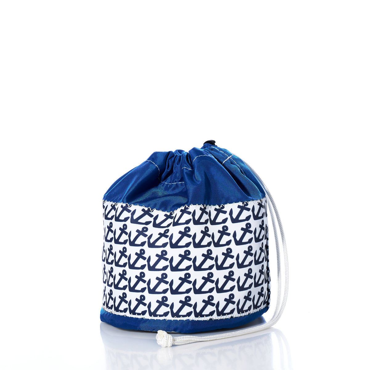 Introducing the Anchor Pop Ditty Bag by Sea Bags: a blue drawstring bag with a white cord, adorned with a band featuring black anchors on white—evoking the charm of classic sail cloth utility bags.