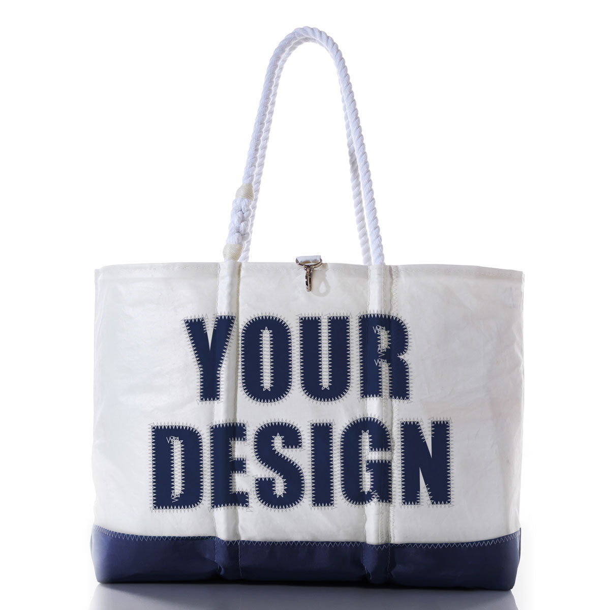 Custom Design Ogunquit Beach Tote by Sea Bags, featuring a white body with a navy blue base, sturdy rope handles, and YOUR DESIGN boldly printed in large navy letters on the front, shown against a white background. by Sea Bags