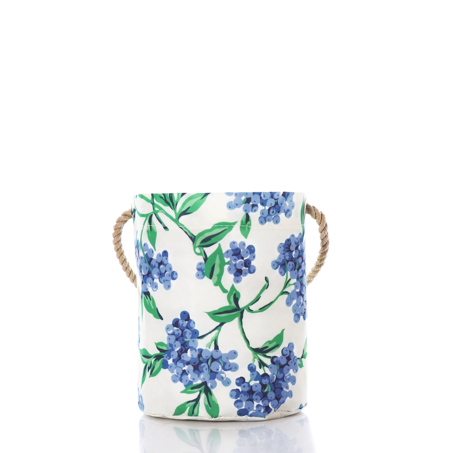 The Blueberry Print Bucket Bag by Sea Bags features a white ceramic design adorned with a blue and green floral pattern inspired by Maine blueberries, complete with rope handles on each side. Stylishly set against a white background, this versatile organizer adds charm to any room. by Sea Bags