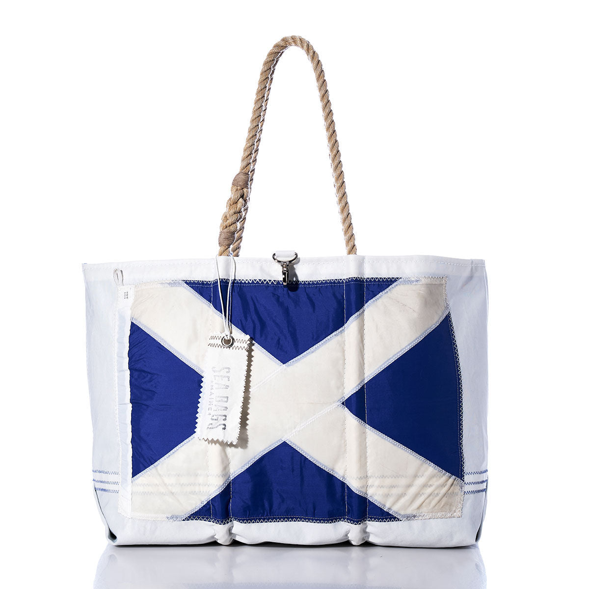 Sea Bags Mike Signal Flag Large Tote, made from recycled sail cloth and featuring rope handles and a blue-and-white diagonal cross pattern inspired by the Scottish flag, shown against a white background. by Sea Bags