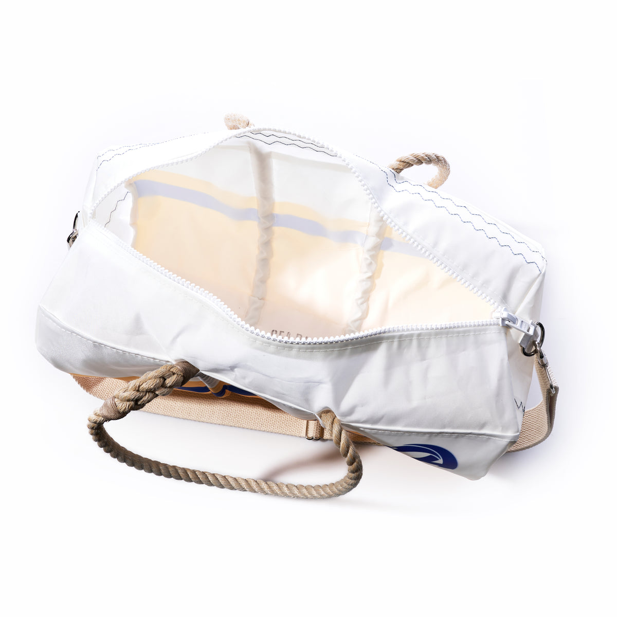 The Sea Bags Los Angeles Rams Duffel, crafted from white recycled sail cloth and featuring rope handles, is shown unzipped to reveal its empty, light-colored interior against a white background.
