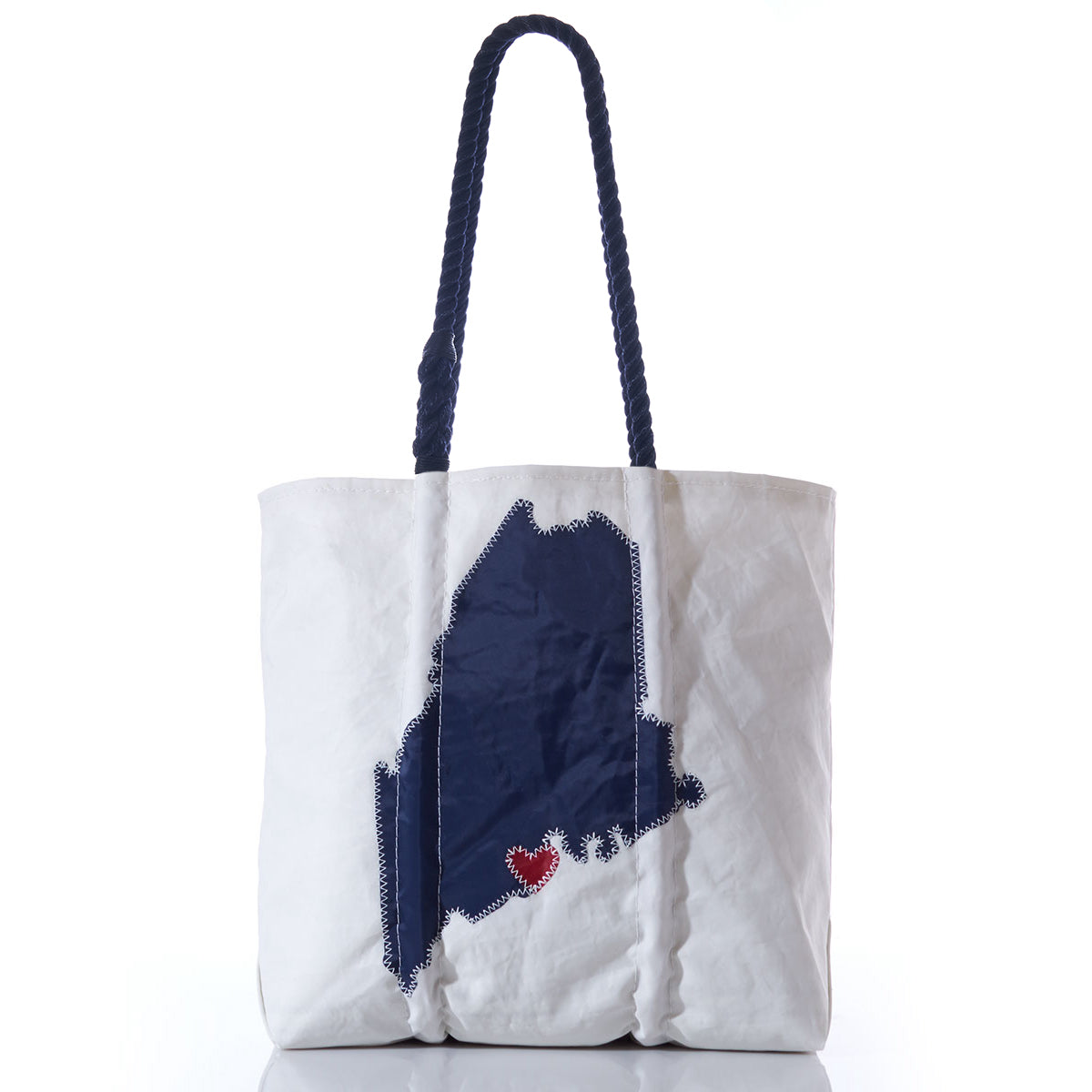 The Sea Bags Custom Maine Tote features dark blue rope handles and a navy outline of Maine with a small red heart near the base—making it a perfect personalized gift or everyday tote for anyone who loves Maine. by Sea Bags