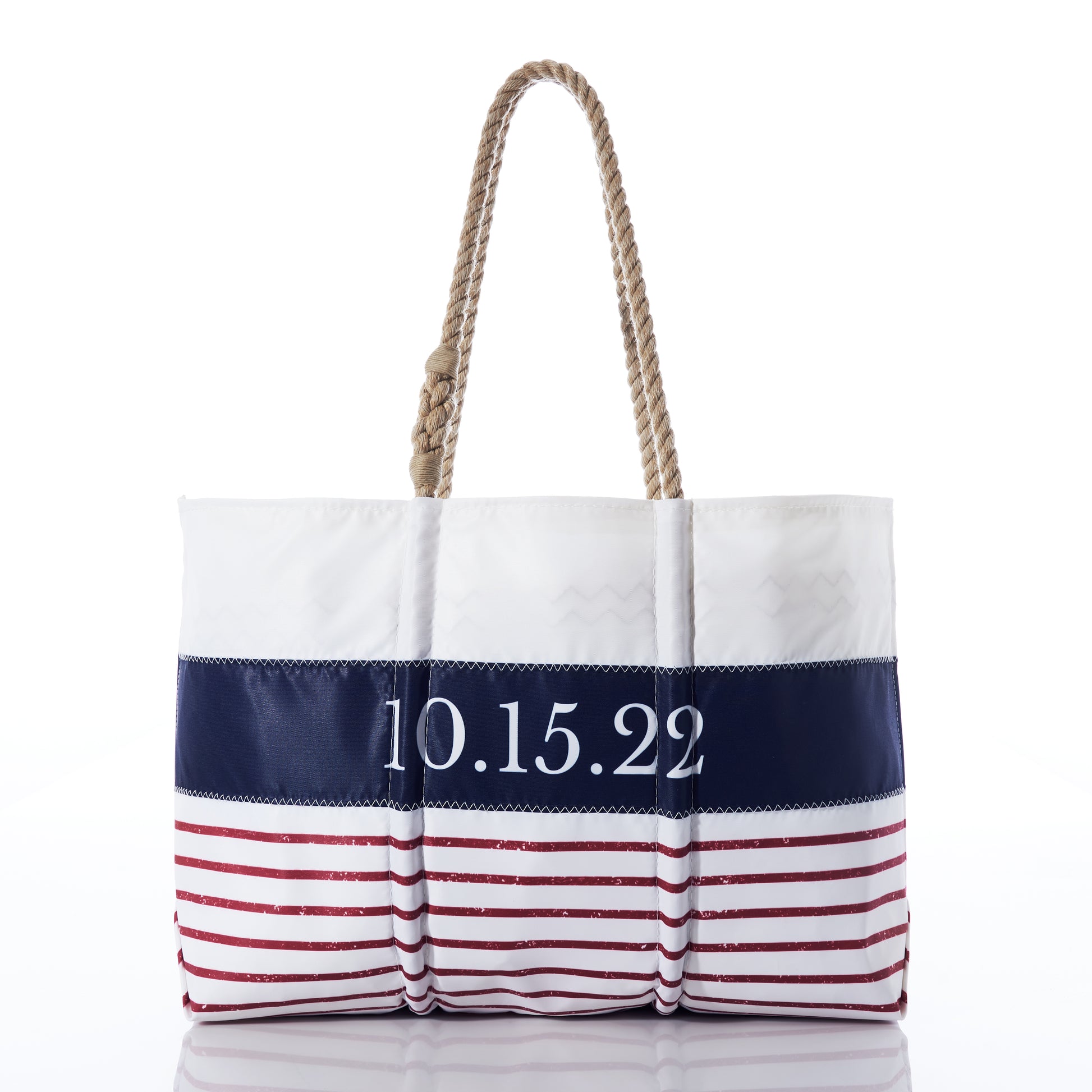 Sea Bags Custom Mariner Stripe Tote featuring a white design with rope handles, a navy blue band displaying 10.15.22, and red horizontal stripes along the bottom. by Sea Bags