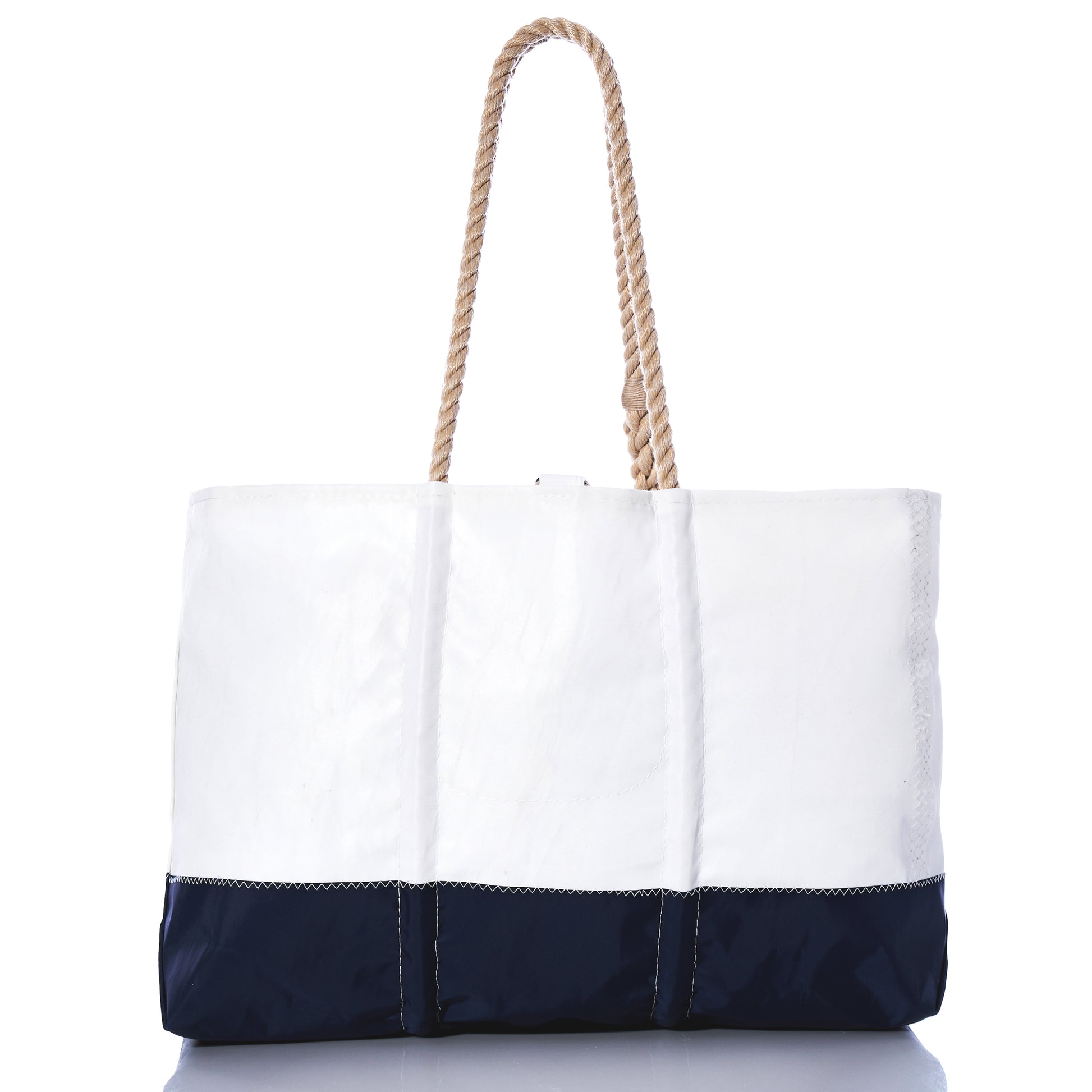 Sea Bags Maine Life Large Tote—a spacious white and navy canvas bag with tan rope handles, inspired by Erin Ovalle’s Maine Life collection and photographed on a white background. by Sea Bags