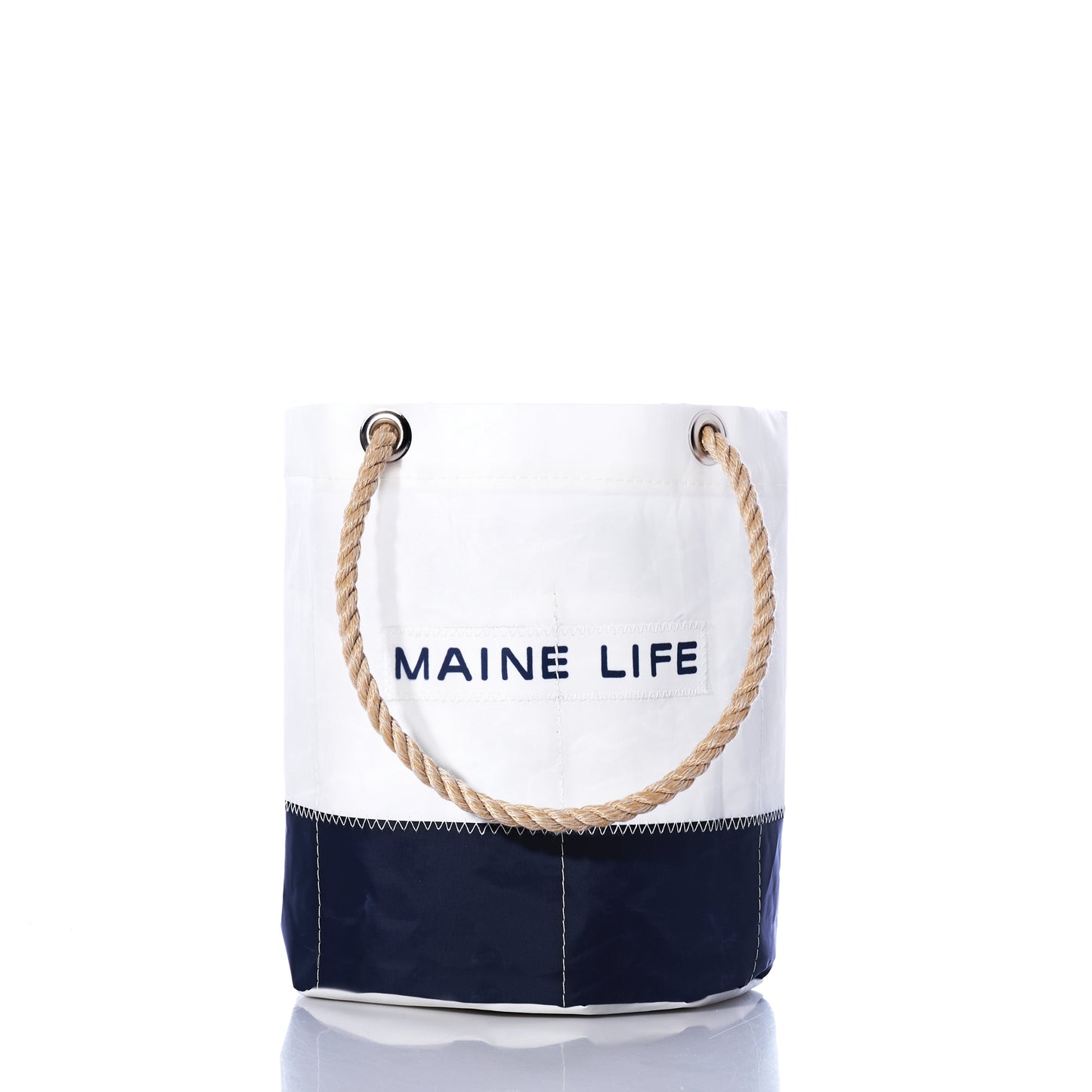 Maine Life Beverage Bucket by Sea Bags, featuring navy blue and white recycled sail cloth with MAINE LIFE text and rope handles, standing upright on a white background. by Sea Bags