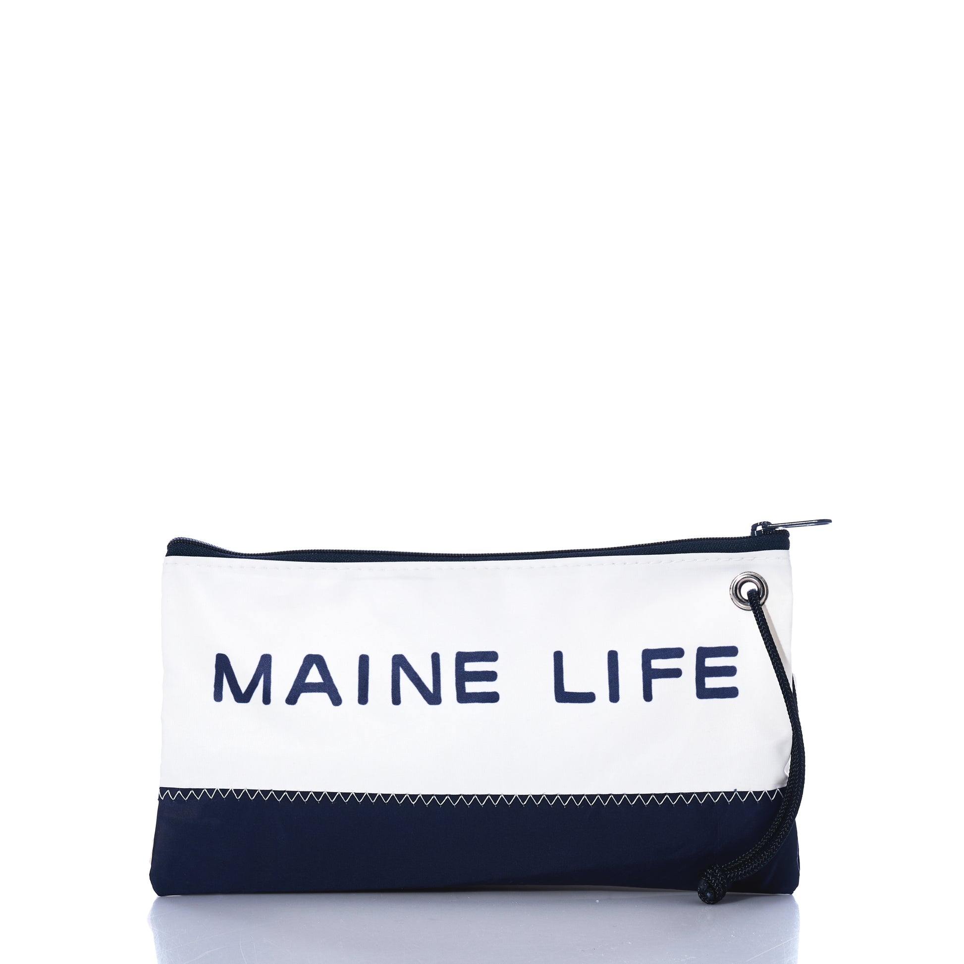 The Maine Life Large Wristlet by Sea Bags is a rectangular pouch with a wrist strap, featuring a zippered closure. It has a white top and navy bottom, and showcases MAINE LIFE—named after the popular TV show—in bold navy letters. by Sea Bags