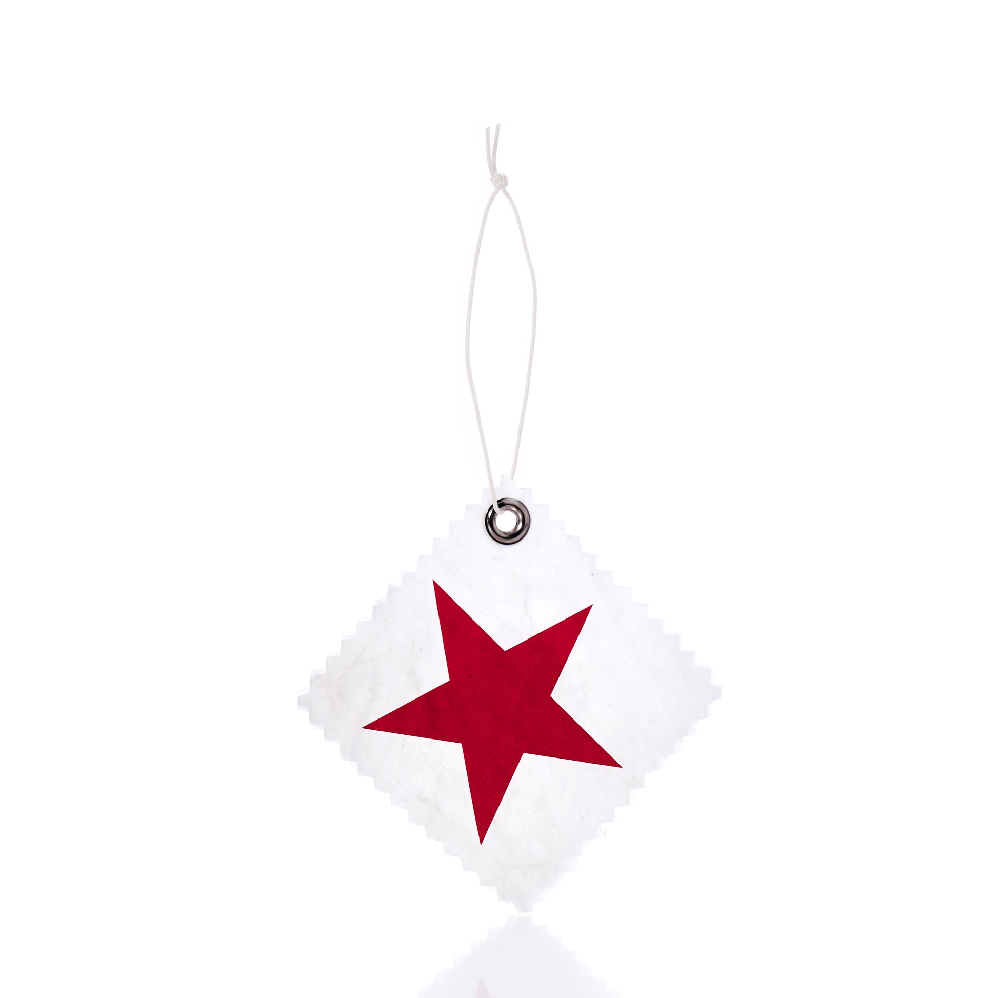 The Sea Bags Star Sail Cloth Gift Tag features a white, square-shaped design crafted from recycled sailcloth, with a bold red star at its center. It includes a metal-reinforced hole and string for hanging, shown against a white background. by Sea Bags