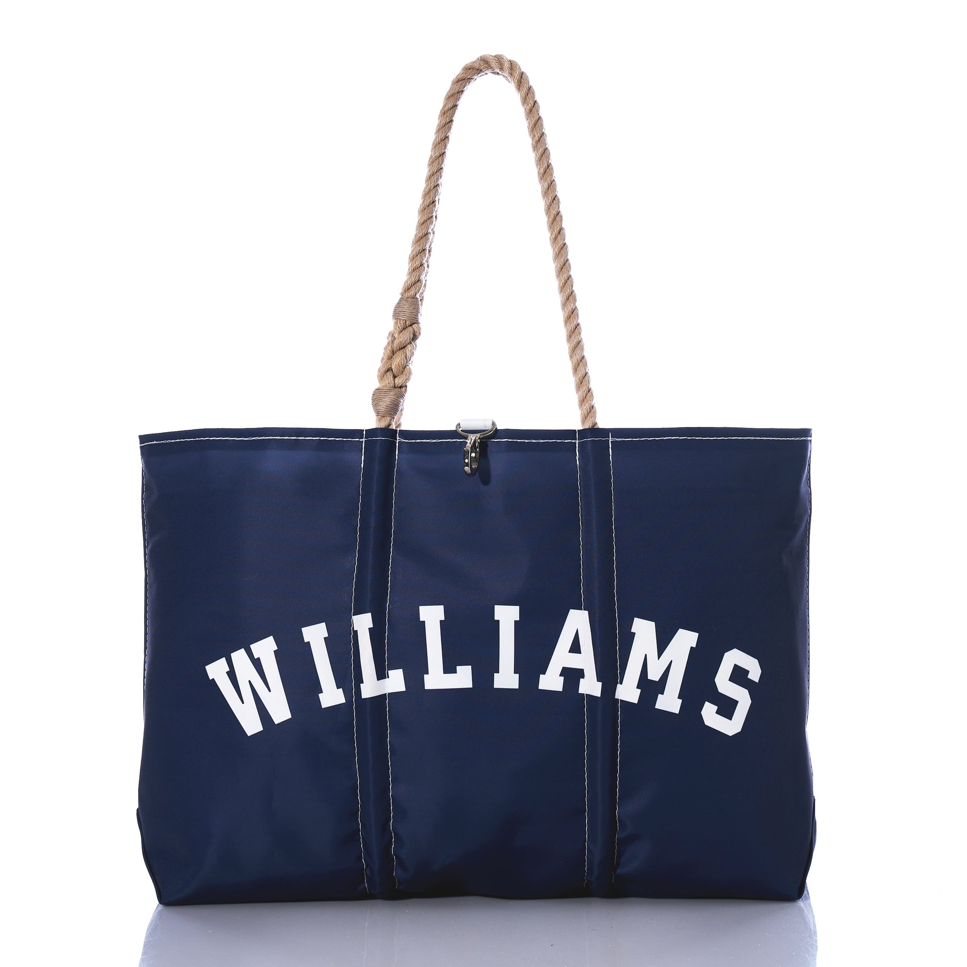 Navy blue Custom Family Gift Tote by Sea Bags, crafted from recycled sail cloth with white WILLIAMS text on the front and rope-style handles, displayed against a white background. by Sea Bags