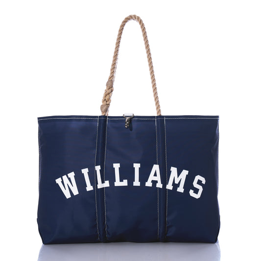 Navy blue Custom Family Gift Tote by Sea Bags, crafted from recycled sail cloth with white WILLIAMS text on the front and rope-style handles, displayed against a white background. by Sea Bags